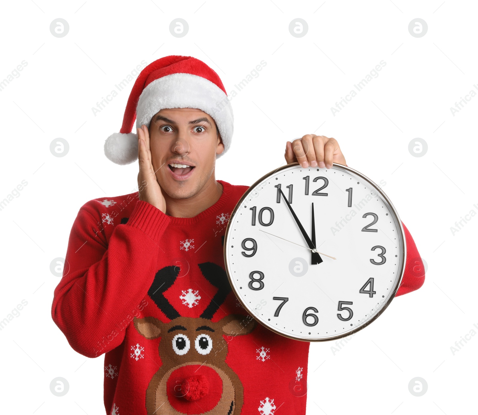 Photo of Man in Santa hat with clock on white background. New Year countdown