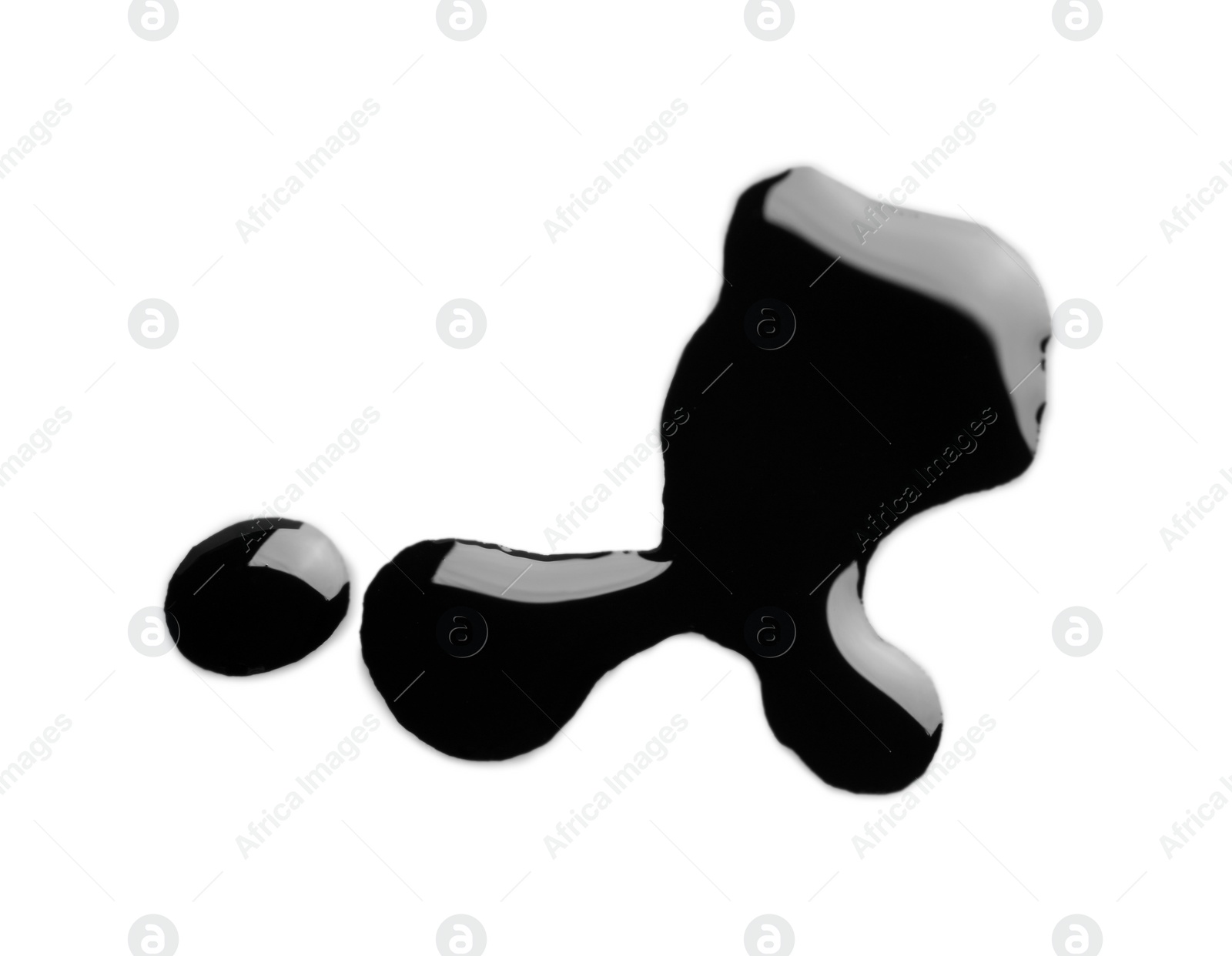 Photo of Blobs of black oil isolated on white, top view