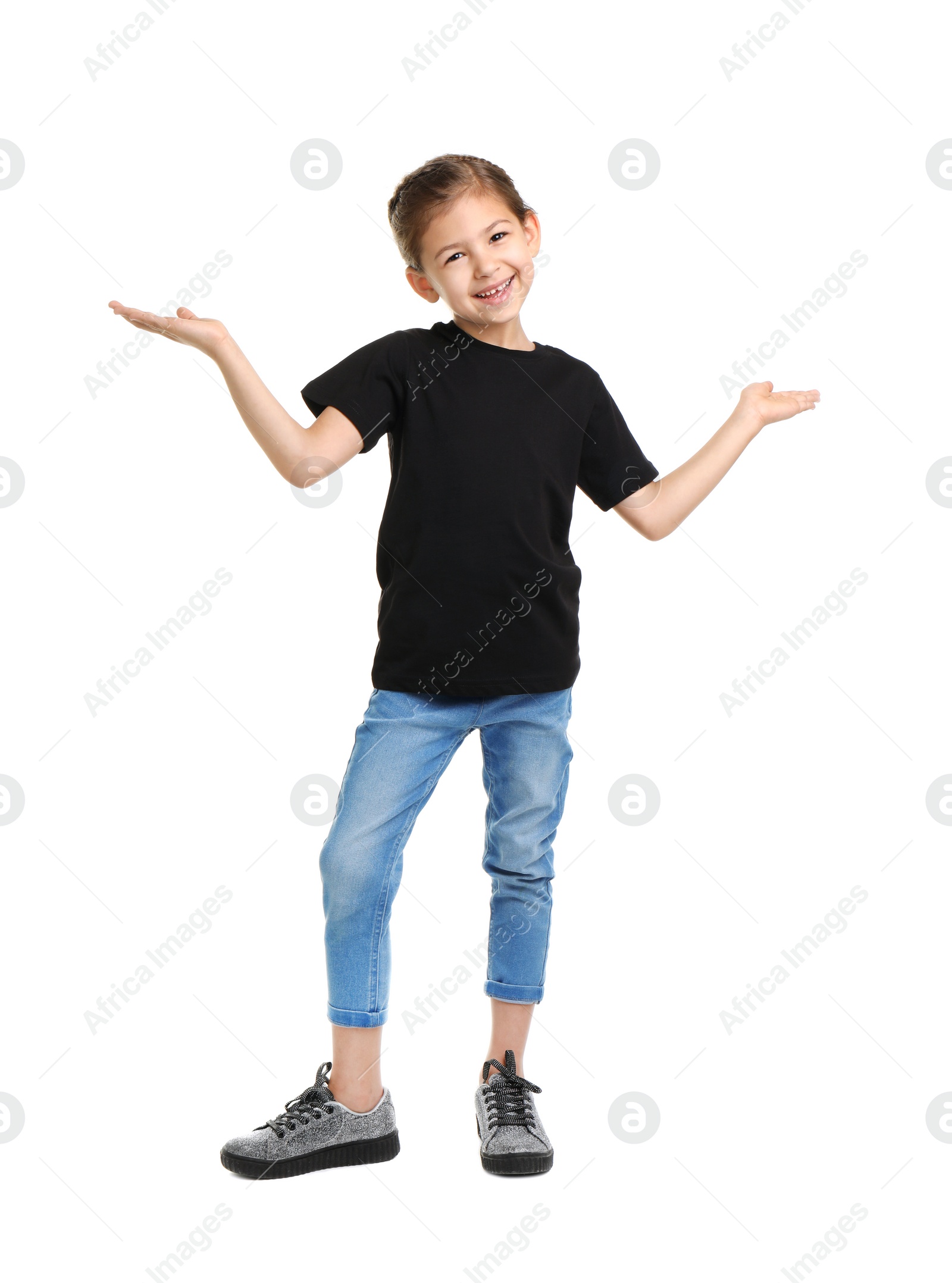 Photo of Little girl in t-shirt on white background. Mockup for design