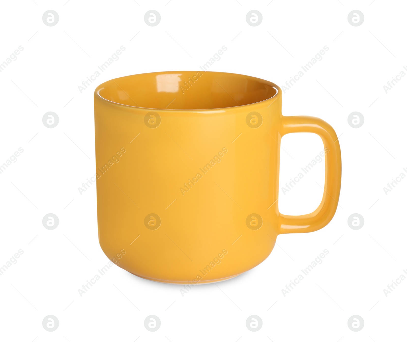 Photo of New yellow ceramic cup isolated on white