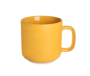 New yellow ceramic cup isolated on white