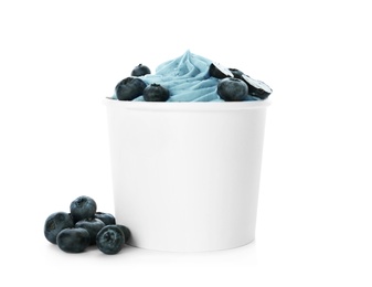 Cup of tasty frozen yogurt with blueberries on white background