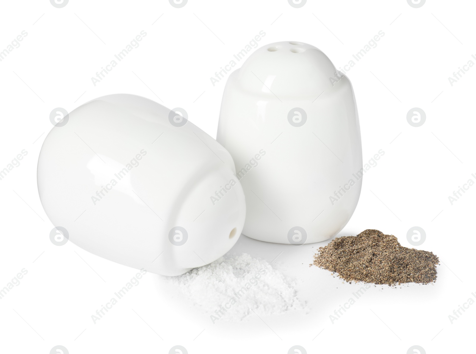 Photo of Two shakers with pepper and salt isolated on white