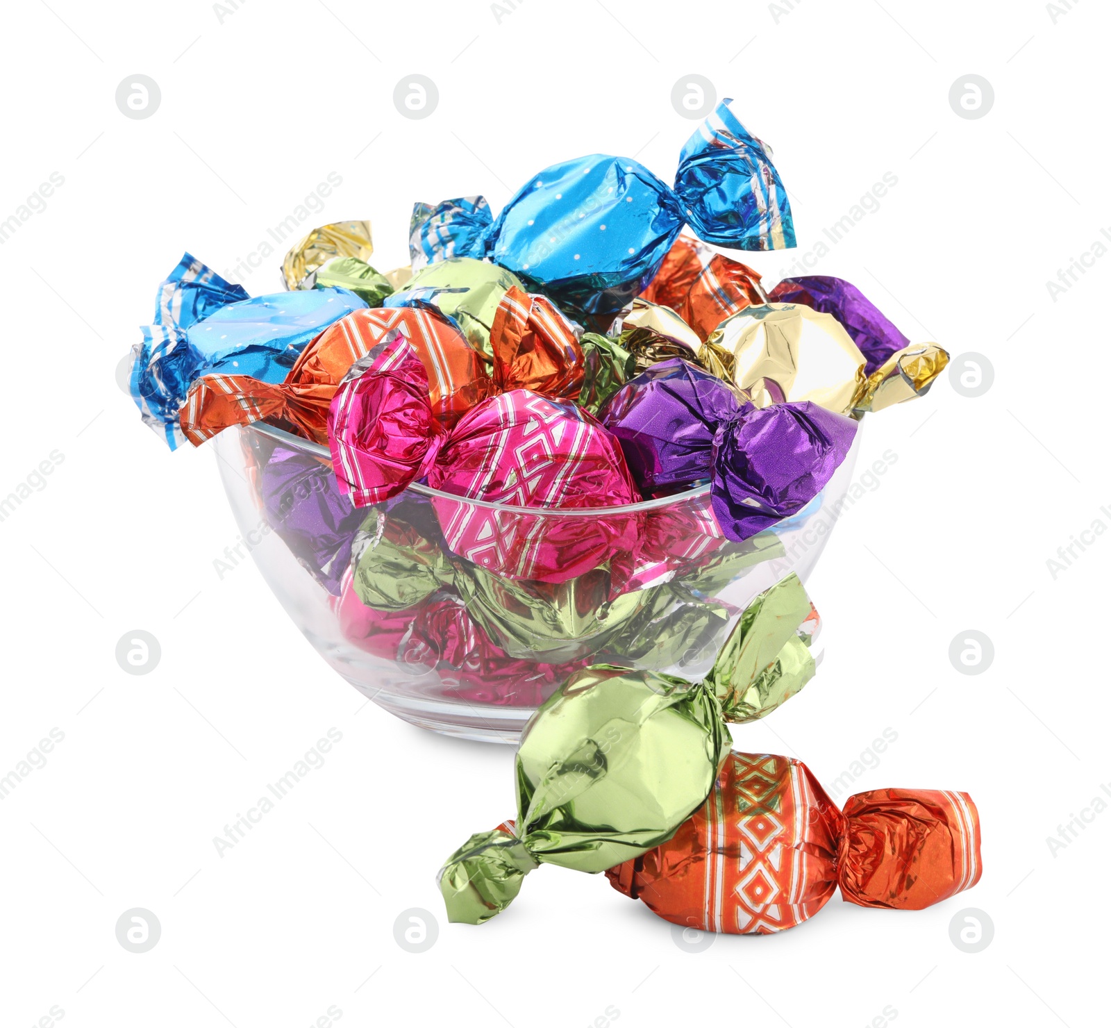 Photo of Bowl with sweet candies in colorful wrappers on white background