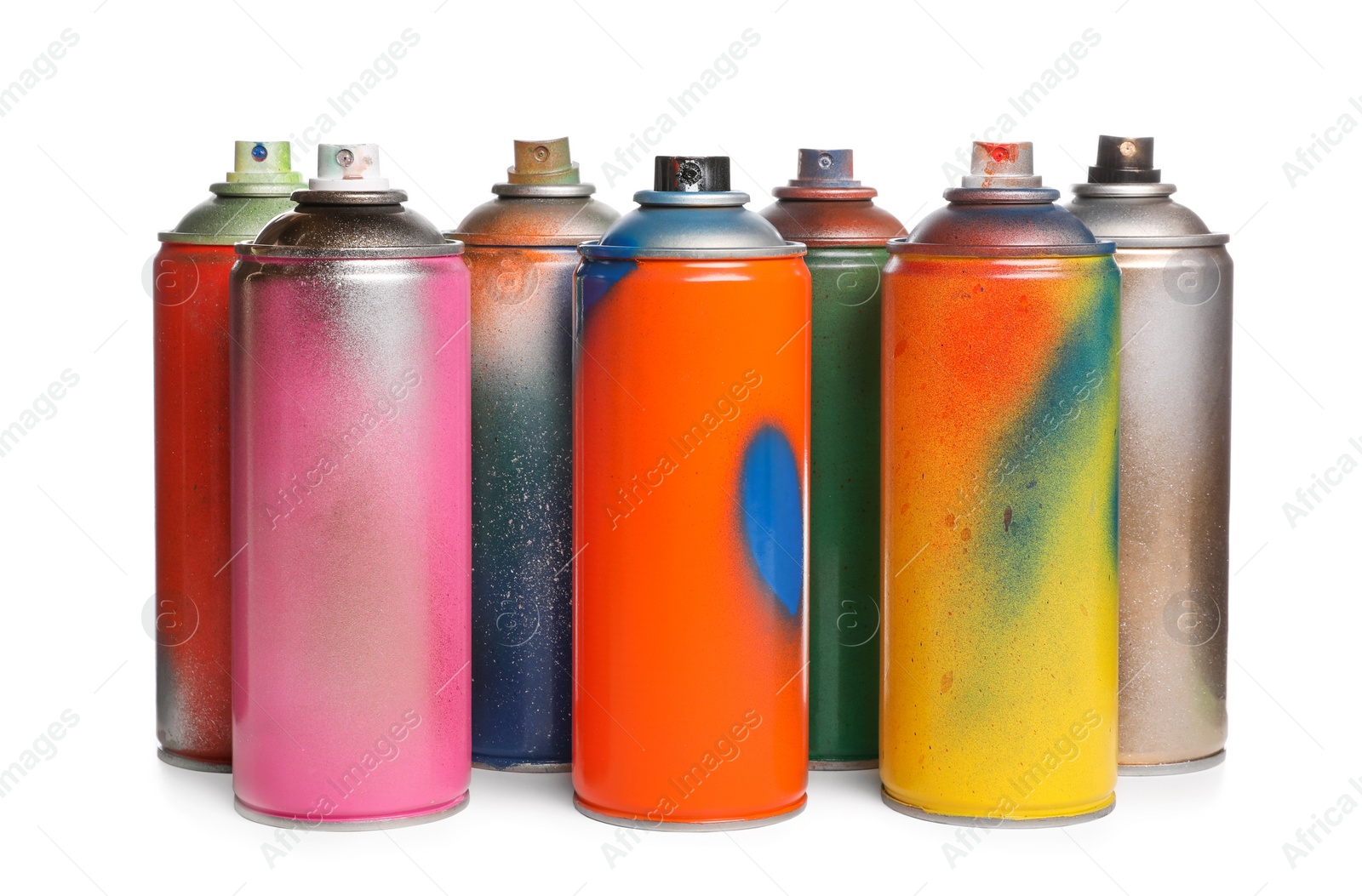 Photo of Used cans of spray paints on white background