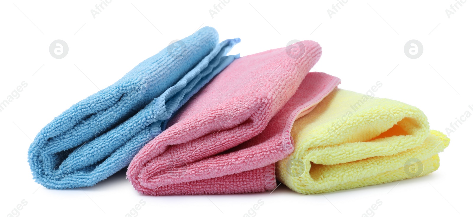 Photo of Many colorful microfiber cloths on white background