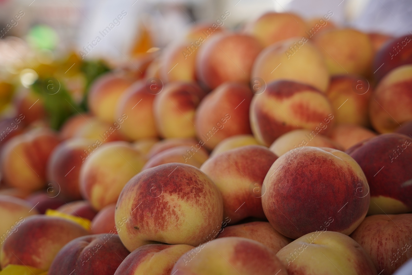 Photo of Heap of fresh ripe peaches, closeup view