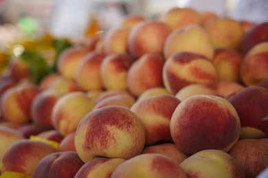 Heap of fresh ripe peaches, closeup view