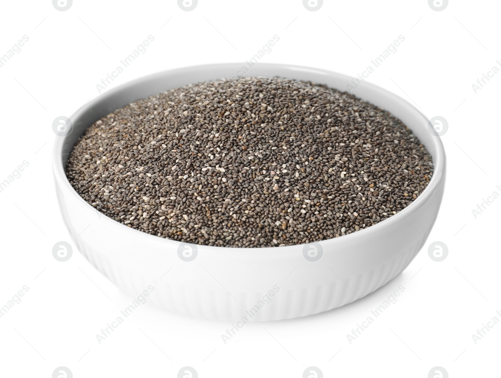 Photo of Chia seeds in ceramic bowl isolated on white