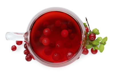 Photo of Cup of delicious cranberry tea and berries isolated on white, top view