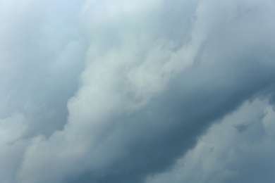 Sky with heavy rainy clouds on grey day