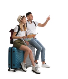 Photo of Couple with map and suitcases on white background. Summer travel