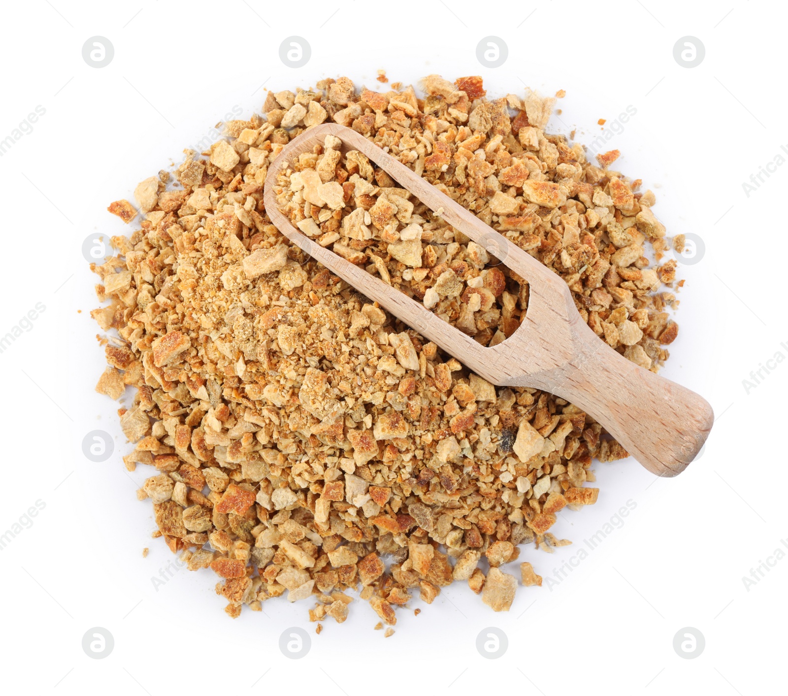 Photo of Dried orange zest seasoning and scoop isolated on white, top view