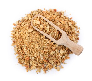 Photo of Dried orange zest seasoning and scoop isolated on white, top view