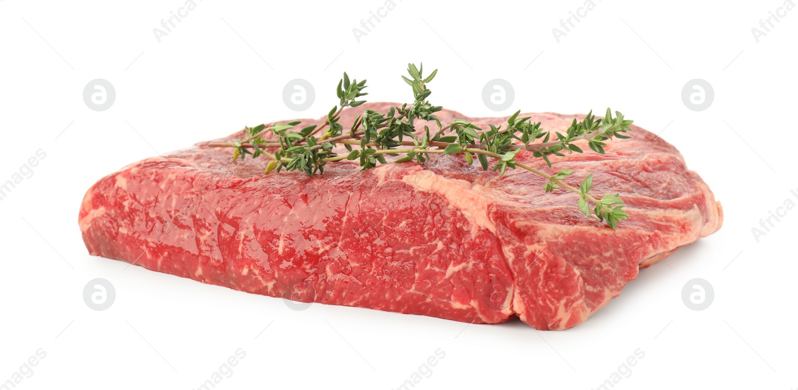 Photo of Fresh raw beef cut with thyme isolated on white