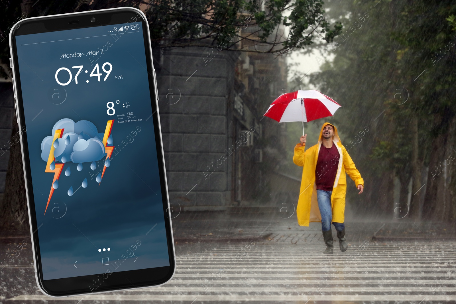 Image of Happy young man with colorful umbrella outdoors and smartphone with open weather forecast app 