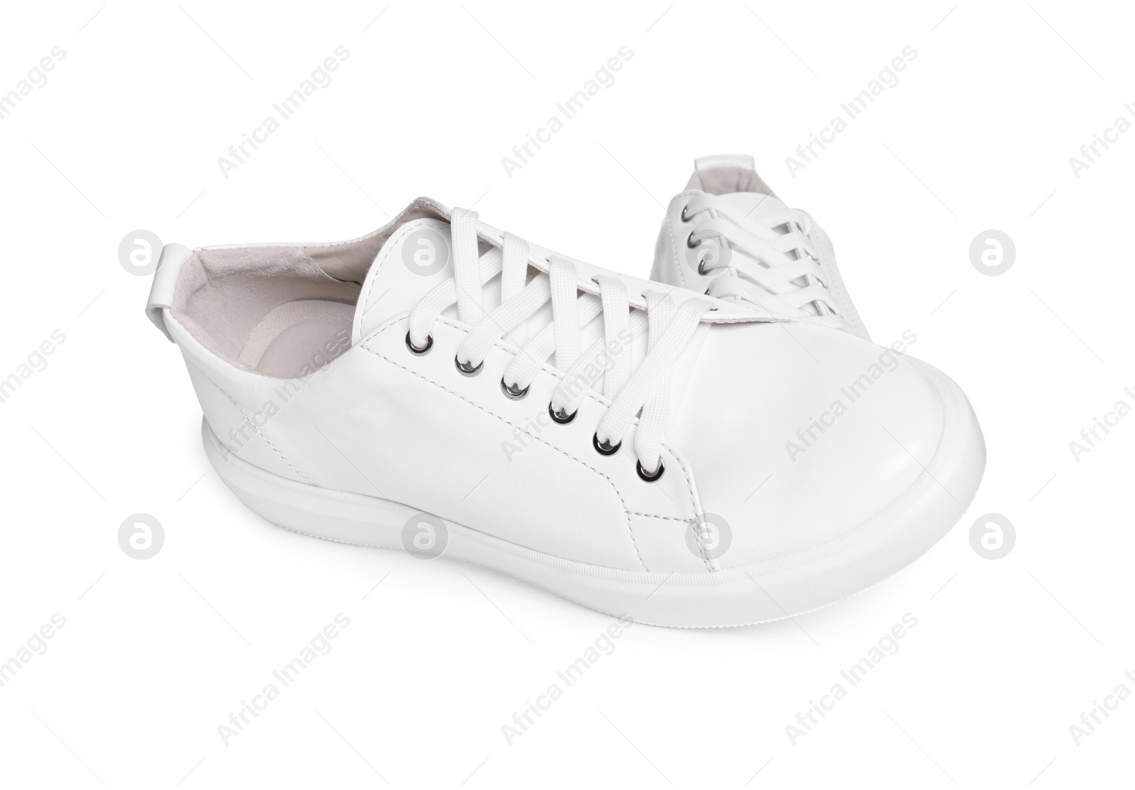 Photo of Pair of stylish sneakers isolated on white