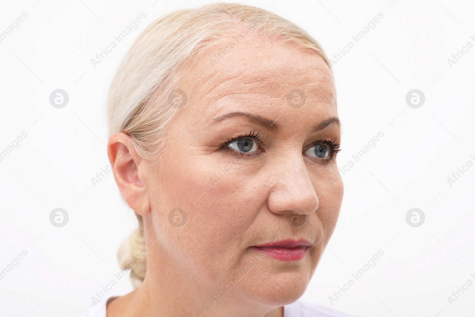 Photo of Portrait of beautiful older woman on white background