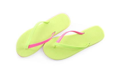 Photo of Pair of stylish green flip flops isolated on white, top view. Beach object