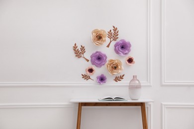 Photo of Stylish room interior with floral decor and table