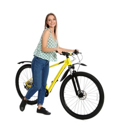 Happy young woman with bicycle on white background