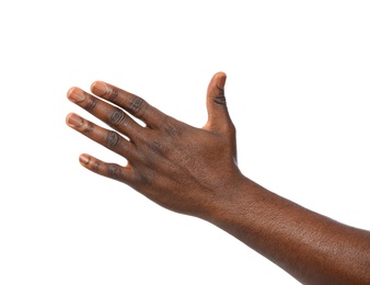 African-American man showing hand gesture on white background, closeup