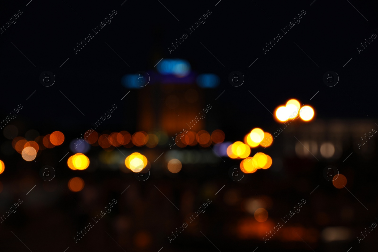 Photo of Blurred view of beautiful city at night. Bokeh effect