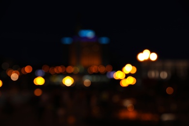 Blurred view of beautiful city at night. Bokeh effect