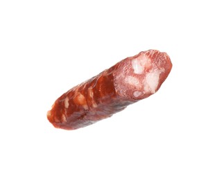 Photo of Piece of thin dry smoked sausage isolated on white