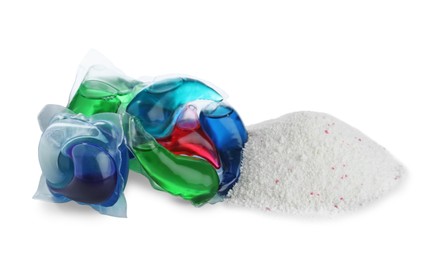 Photo of Color laundry capsules and detergent powder on white background