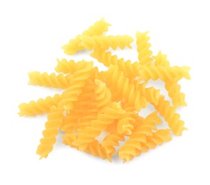 Photo of Pile of raw fusilli pasta isolated on white, top view