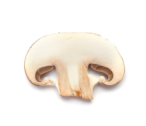 Photo of Slice of fresh champignon mushroom on white background, top view
