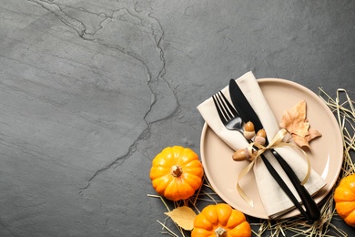 Festive table setting on grey background, flat lay with space for text. Thanksgiving Day