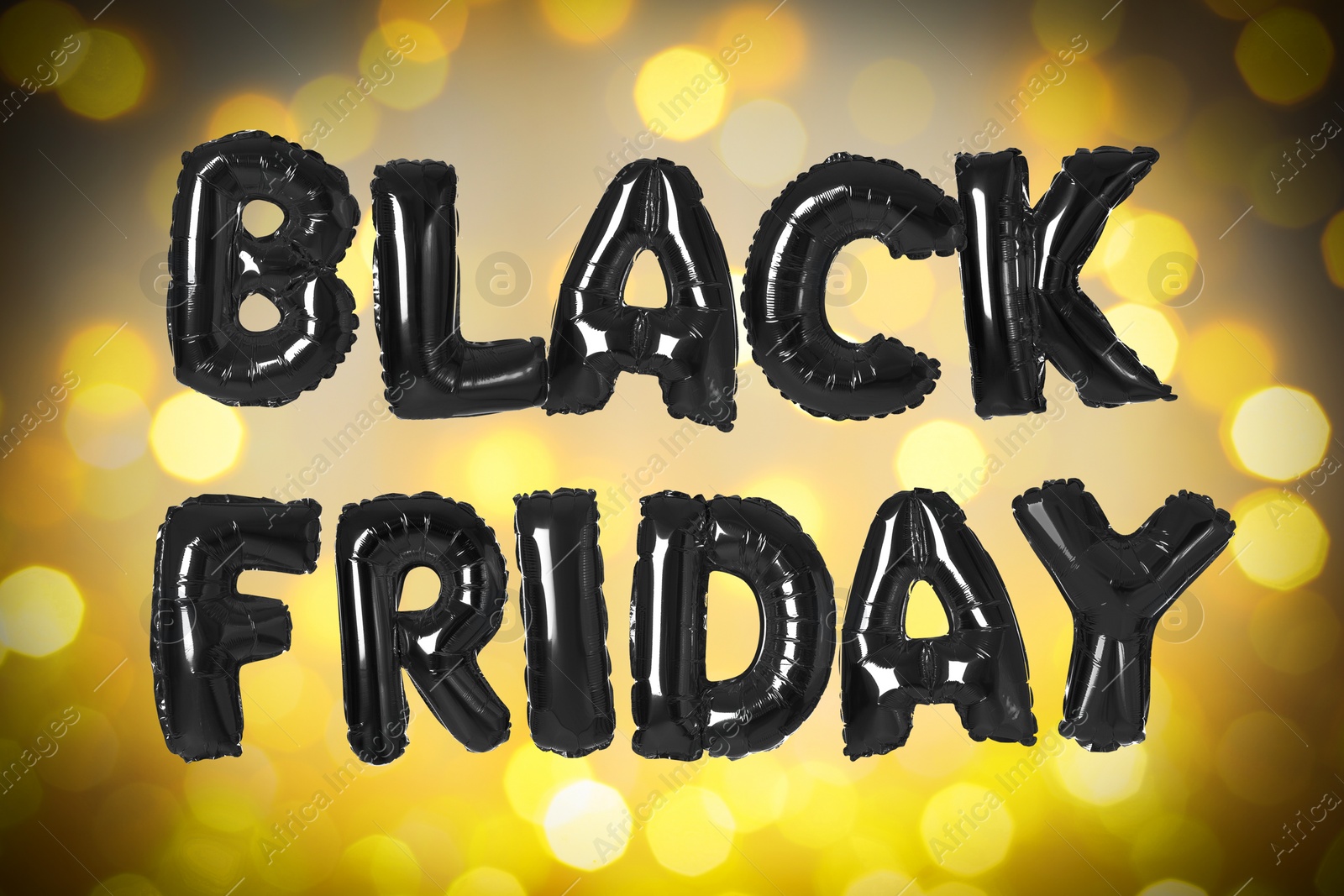Image of Phrase BLACK FRIDAY made of foil balloon letters and blurred lights on background