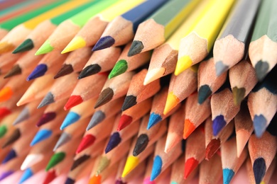 Photo of Different color pencils as background, closeup view