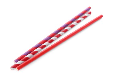 Different paper cocktail straws on white background