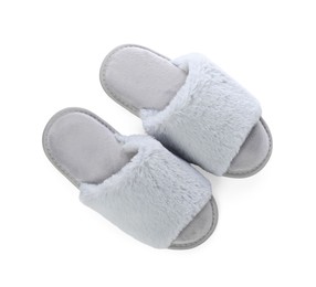 Pair of soft slippers with fur isolated on white, top view