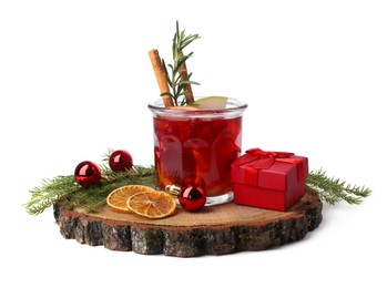 Photo of Aromatic Christmas Sangria in glass, gift box and festive decor isolated on white