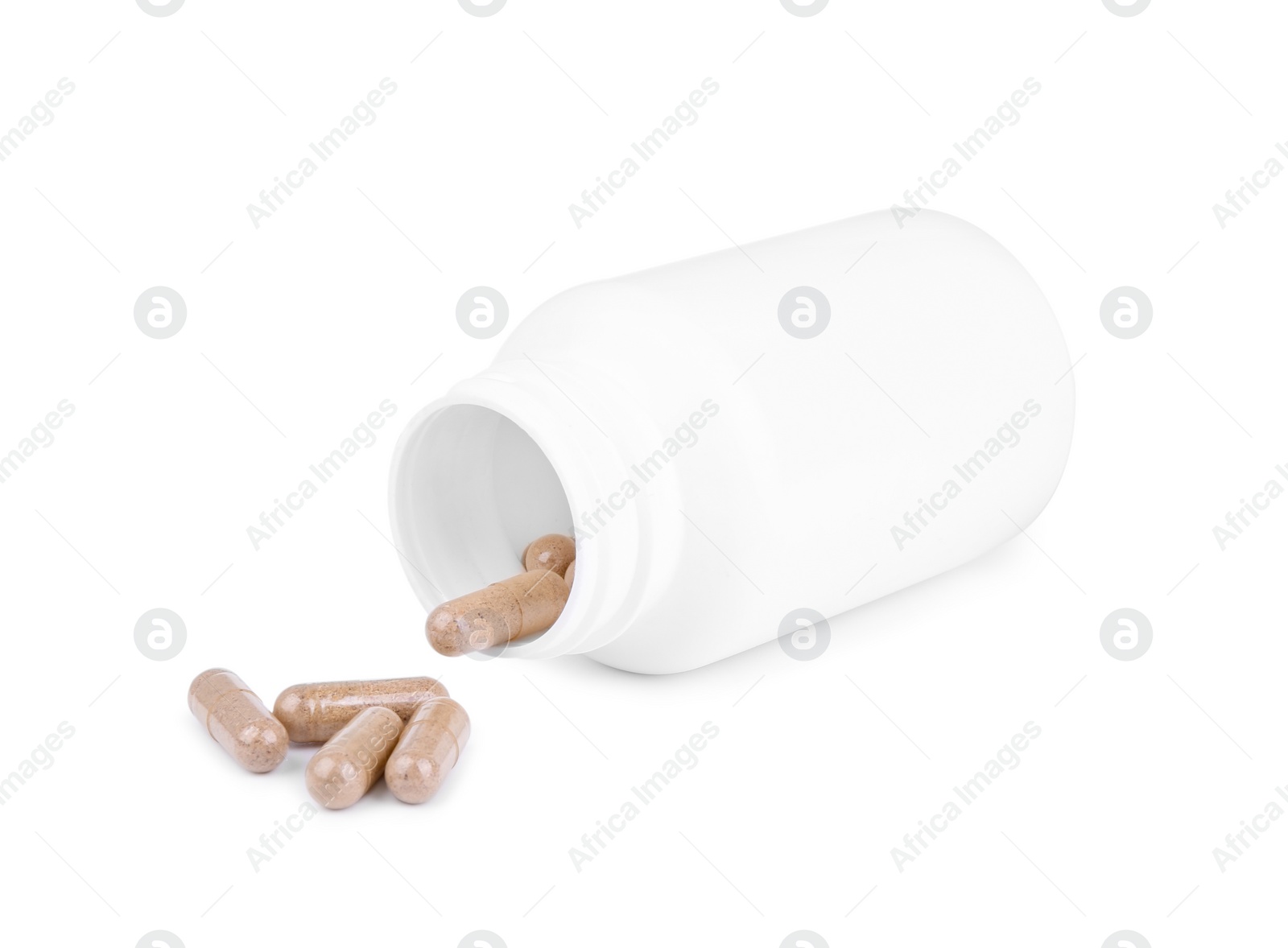 Photo of Vitamin capsules and medical bottle isolated on white