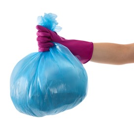 Photo of Woman holding plastic bag full of garbage on white background, closeup