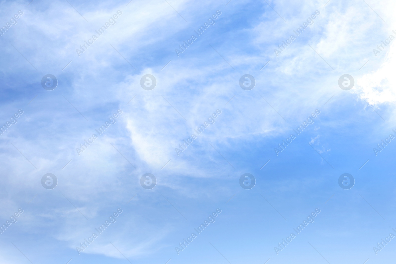 Photo of Picturesque blue sky with white clouds on sunny day