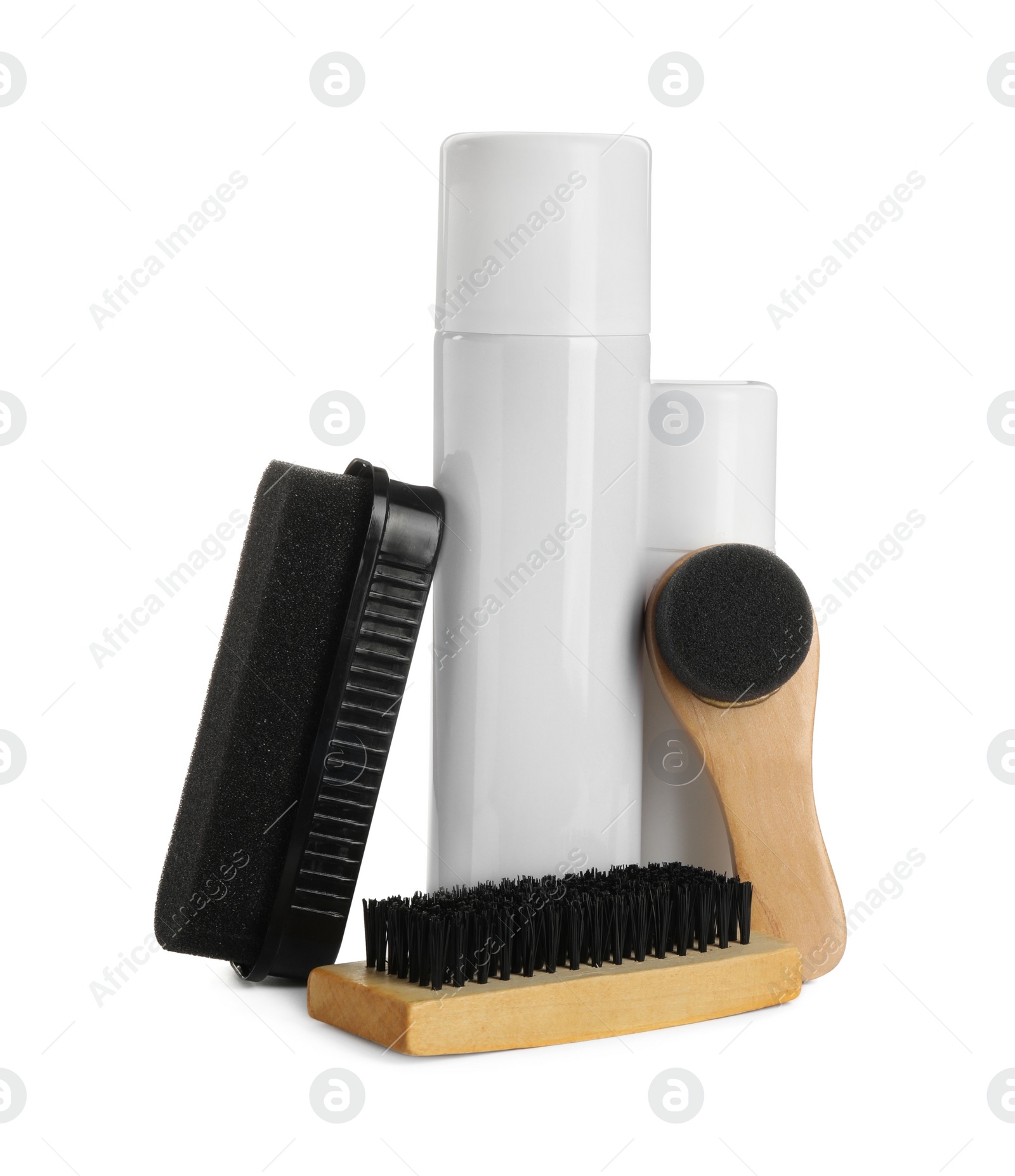 Photo of Set of shoe care products on white background