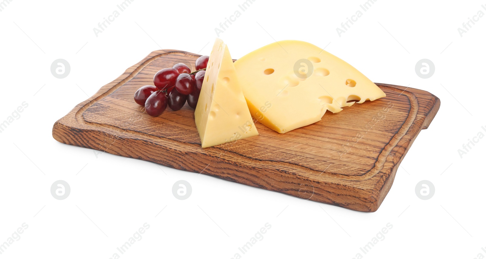 Photo of Pieces of delicious cheese and grapes isolated on white