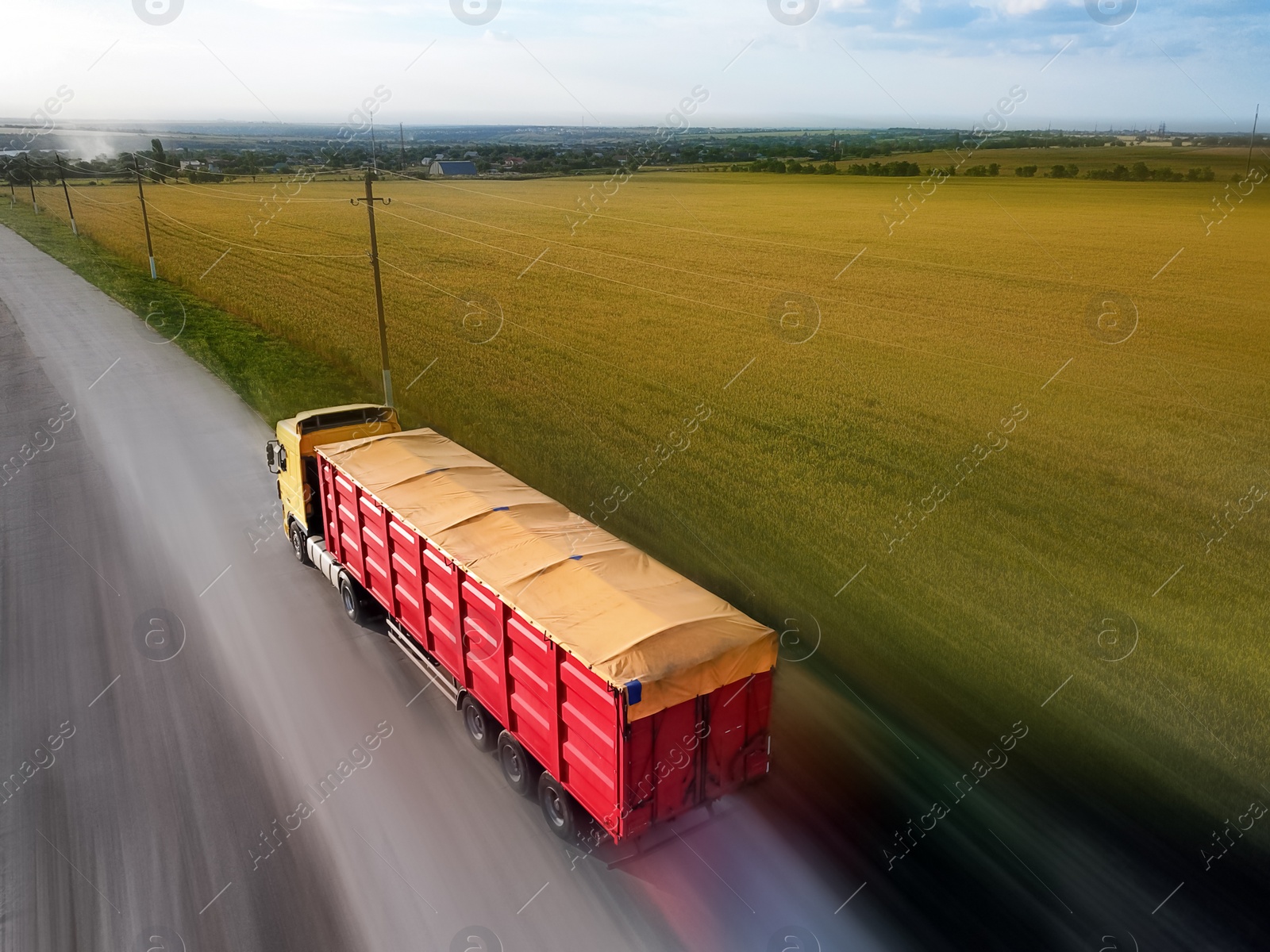 Image of Logistics concept. Truck on country road, motion blur effect 