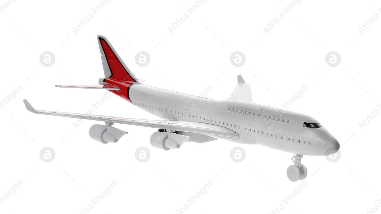 Photo of Toy airplane isolated on white. Travel concept