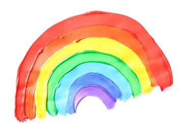Rainbow drawn by different paints on white background, top view