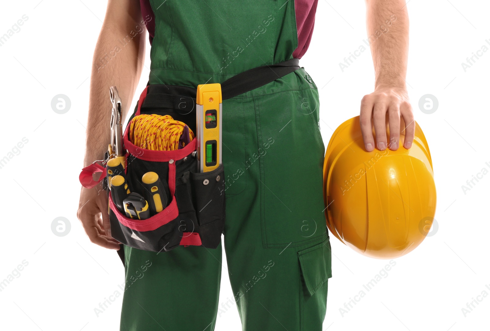 Photo of Professional construction worker with hard hat and tool belt on white background, closeup