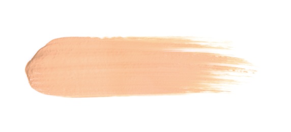 Sample of liquid foundation foundation on white background, top view