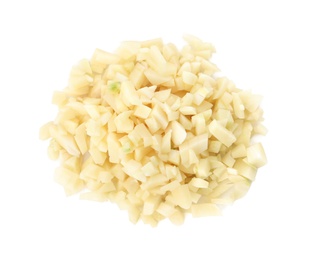 Photo of Pile of fresh chopped garlic isolated on white, top view. Organic food