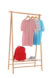 Photo of New wardrobe rack with stylish man's clothes and shoes on white background